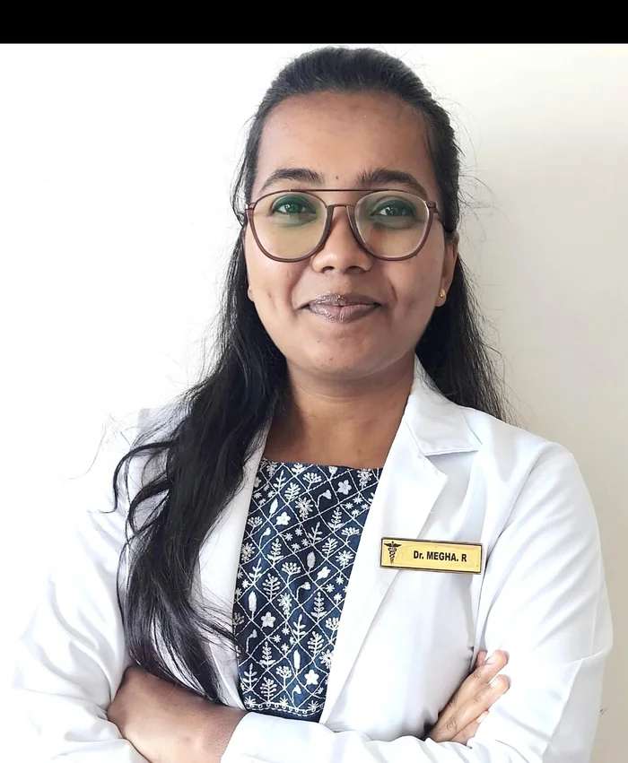 Dr. Megha R