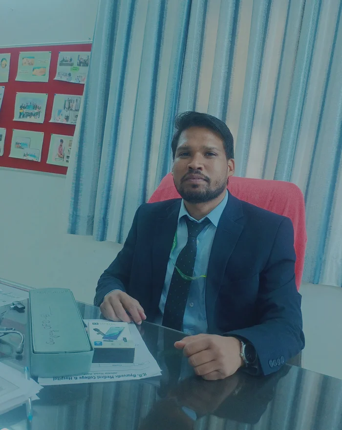 Dr. Manmahendra Singh