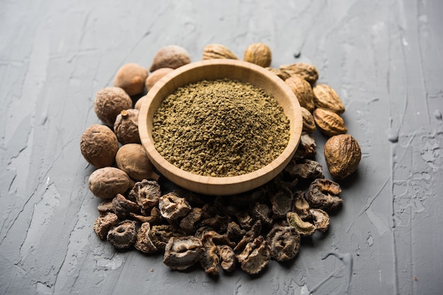 Indian ayurvedic Triphala churan or trifala powder is an ancient medicine for bowel movement or indigestion problems. Selective focus